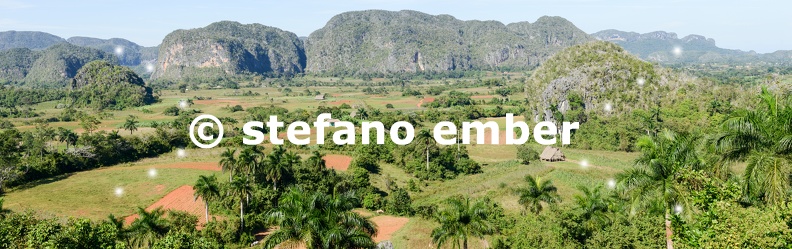 Panoramic_view_over_landscape_with_mogotes_in_Vinales_Valley.jpg