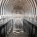 Statue_of_Buddha_on_Ellora_caves_near_Aurangabad.jpg