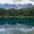 Lake_Carezza_with_reflection_of_mountains_in_the_Dolomites.jpg