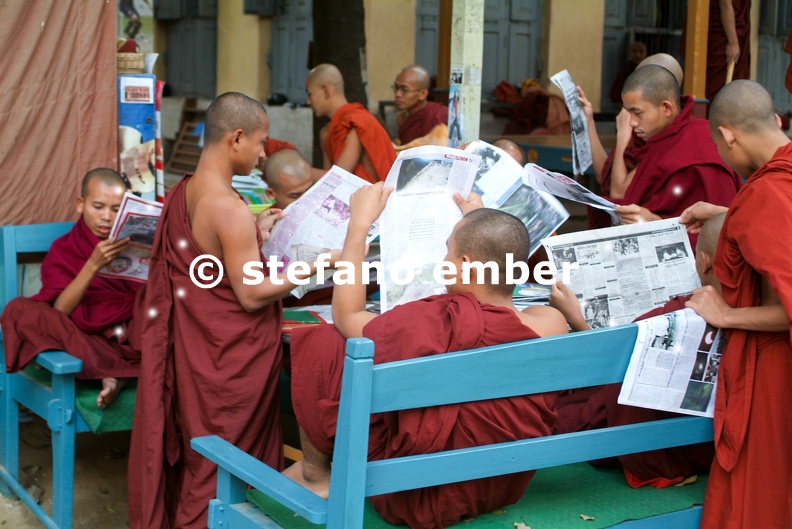 Monks reading newsparers at the  Shwe in Bin Kyaung monastery of Mandaley