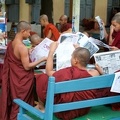 Monks_reading_newsparers_at_the__Shwe_in_Bin_Kyaung_monastery_of_Mandaley.jpg