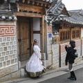woman on traditional dress at Bukchon Hanok village in Seoul