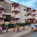 Children waiting in a row to play with an electreic scooter at Vinales