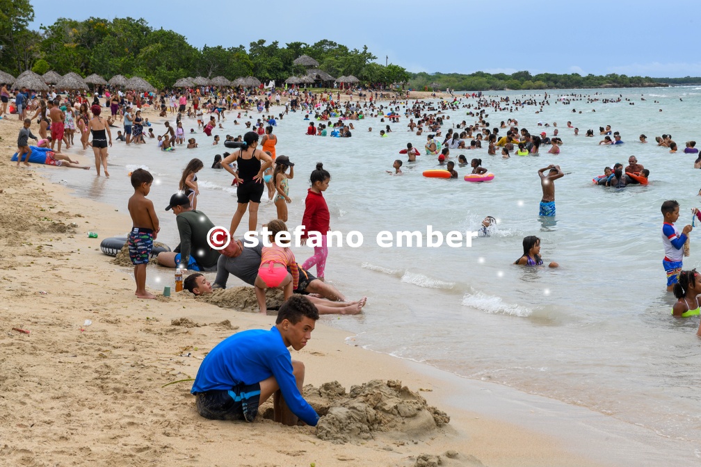 Crowded beach of Playa rancho Luna near Cinfuegos