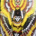 Man_on_costume_at_the_parade_of_Ati-Atihan_festival_in_Kalibo.jpg
