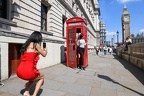 Tourists taking pictures in front of the Big Ben on London