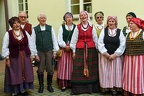 People in folk clothes singing in chorus at Vilniu
