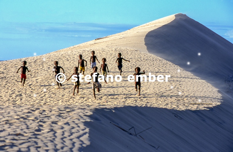 Dune with boys running at Soalara