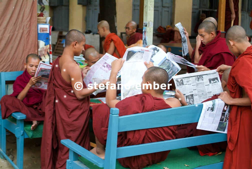 Monks reading newsparers at the  Shwe in Bin Kyaung monastery of Mandaley