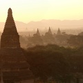 Silhouettes of ancient Buddhist Temples by sunrise at Bagan