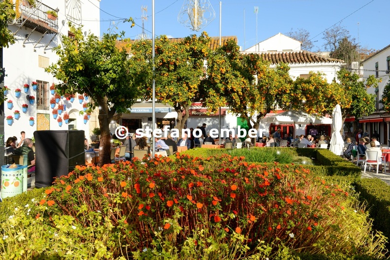 People drinking on a restaurant in front of the city hall at Marbella