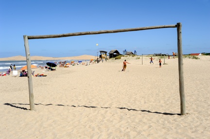 People playing football on the beach of Barra de Valizas