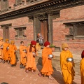 Young_Buddhist_monks_walking_in_morning_alms_at_Bhaktapur.jpg