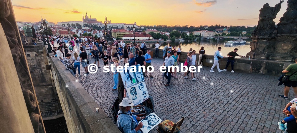 People walking on Charles bridge at Prague